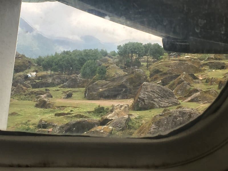 A window view of touchdown at Lukla Airport