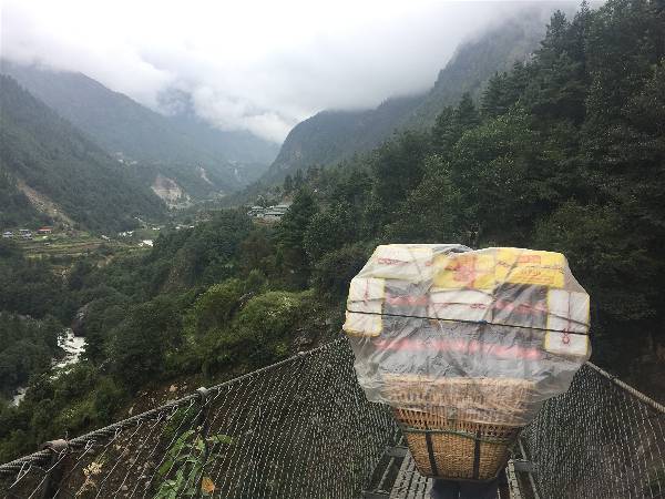 All along the Everest Base Camp Trek, porters carry 60-100lb loads