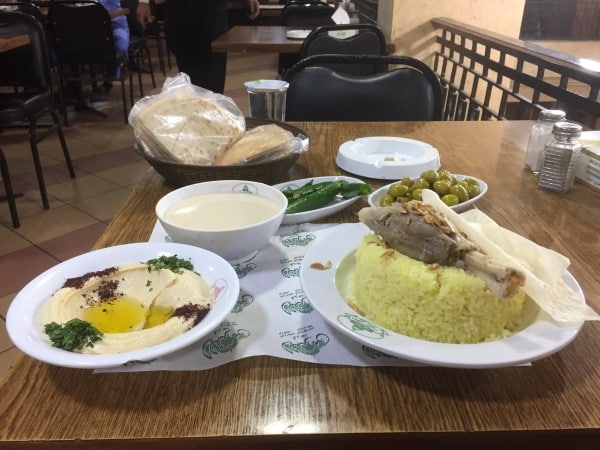 Mansaf, the national dish of Jordan must be properly enjoyed in Amman